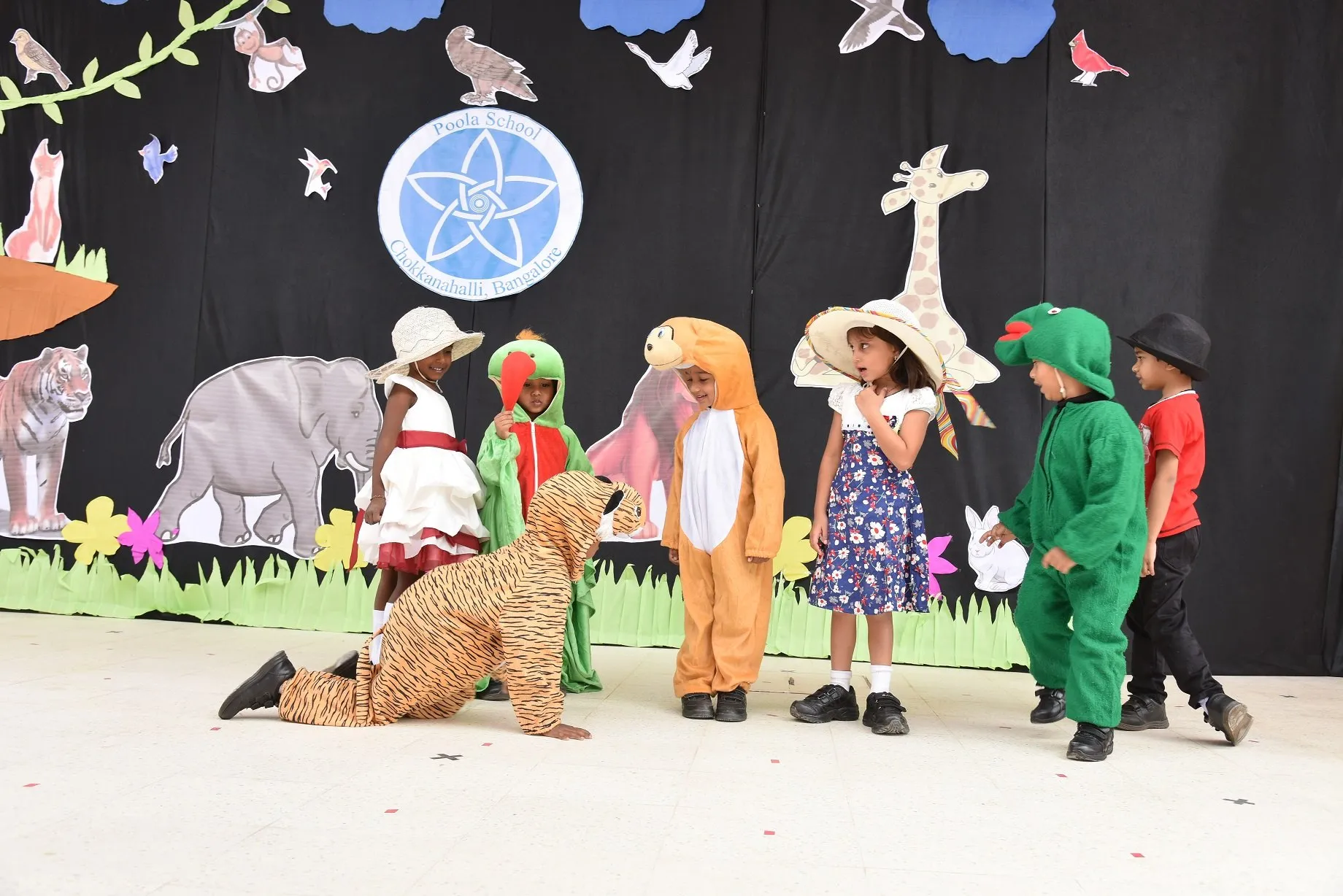 Students performing in costume at the annual day drama