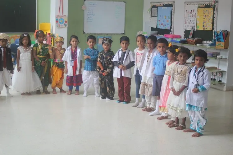 Children in fancy dress as national figures and professions