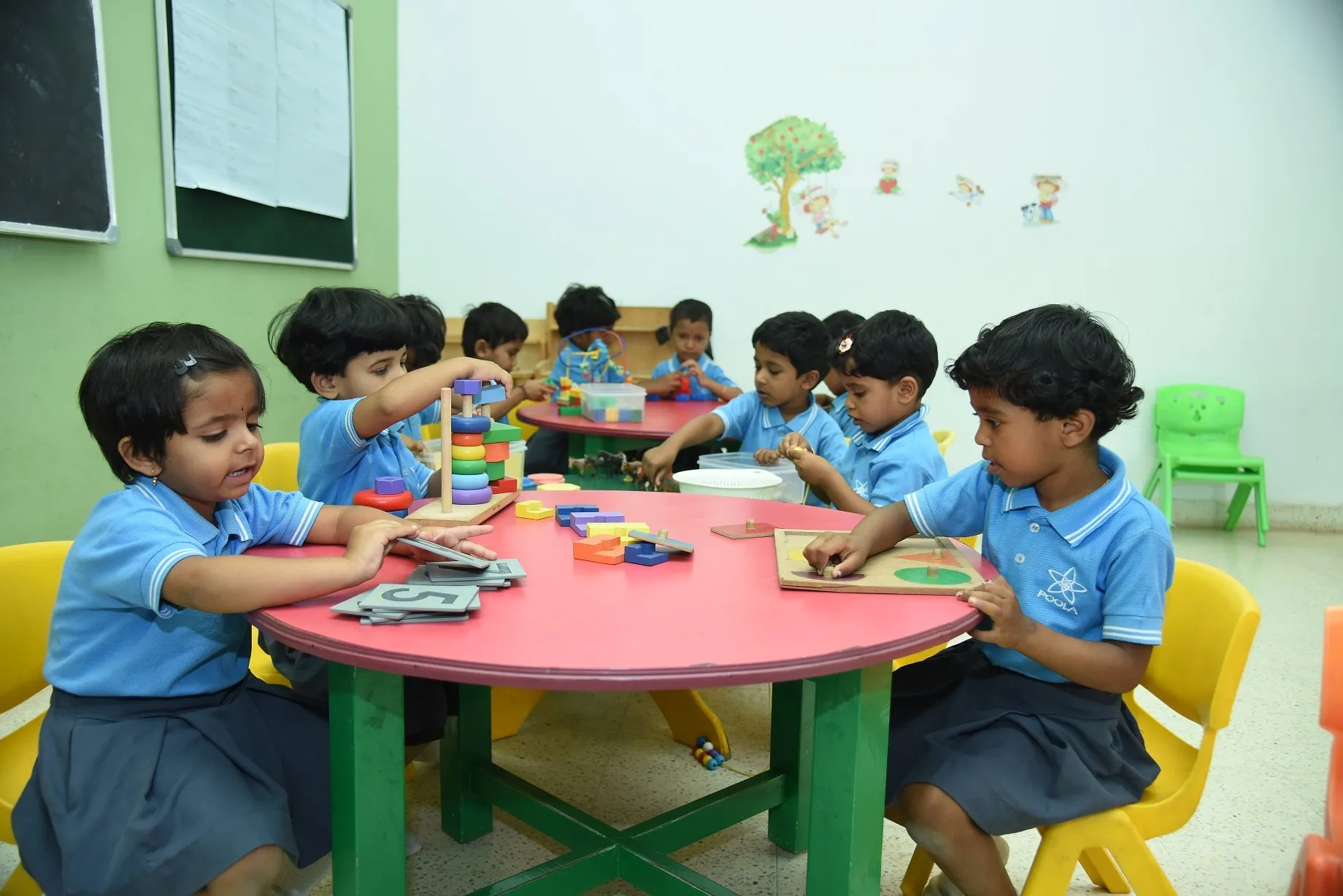 Two children working with Montessori number rods