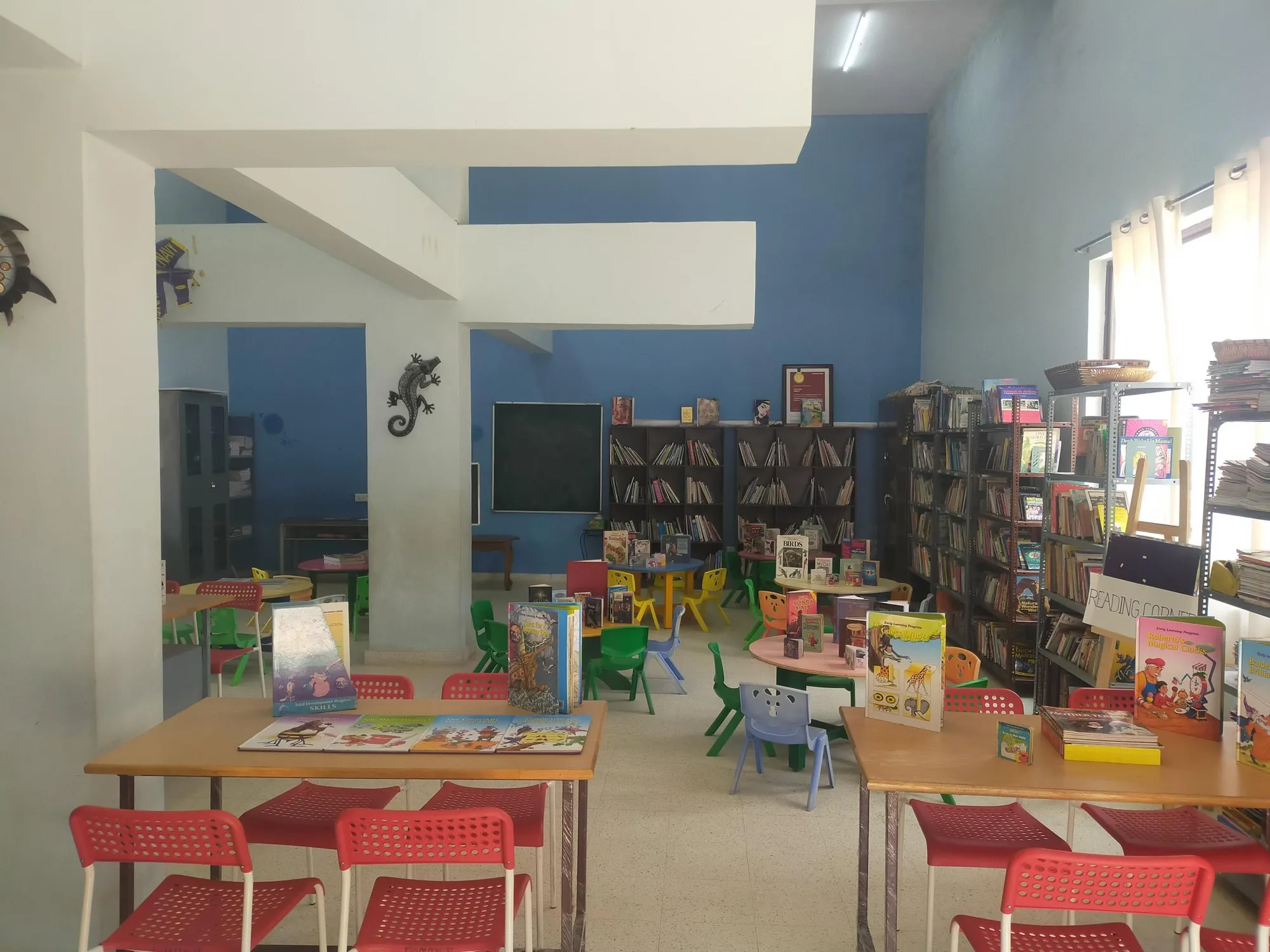 The school reading room, shelves stocked